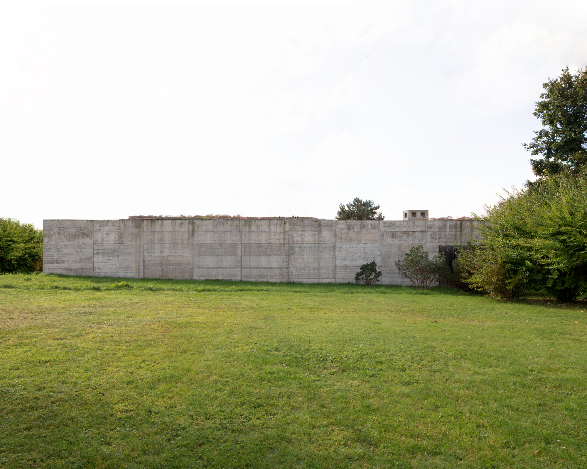 Casa com dois pátios / Büro Mühlbauer